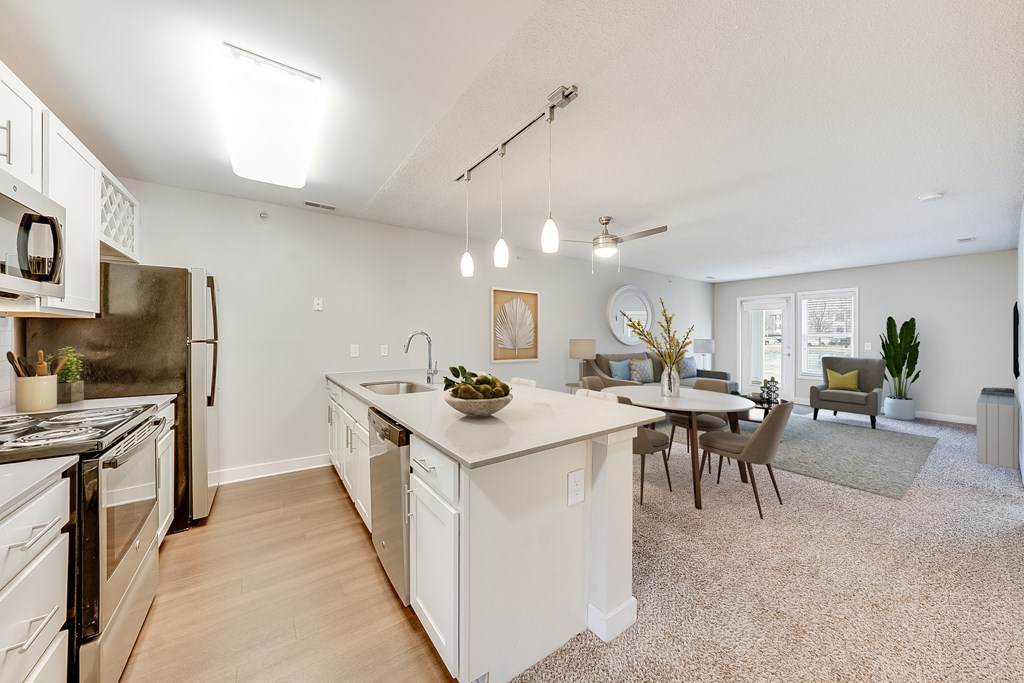 Galley Style Kitchen with Living Room View at Waterfront Apartments, Virginia Beach