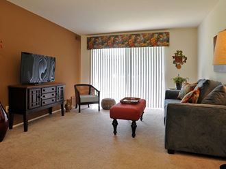 Large Living Room at Fox Pointe Apartments, East Moline, IL, 61244