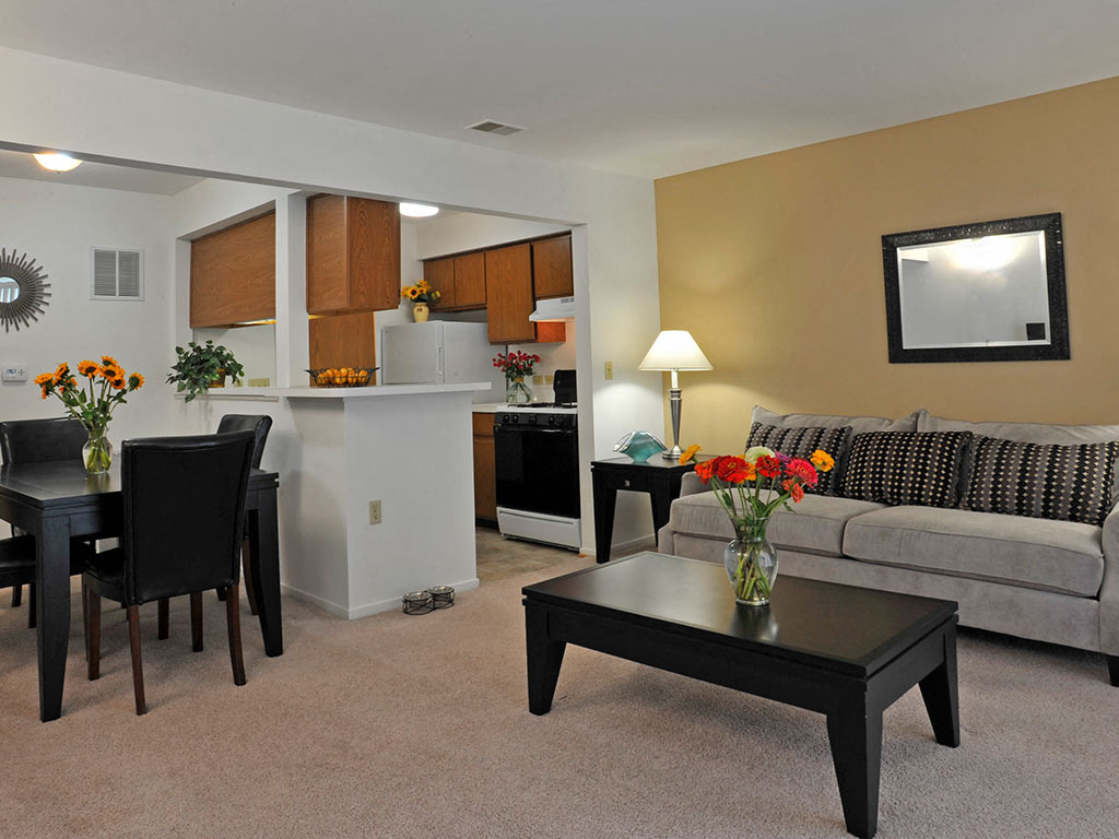 a living room with a couch and a table