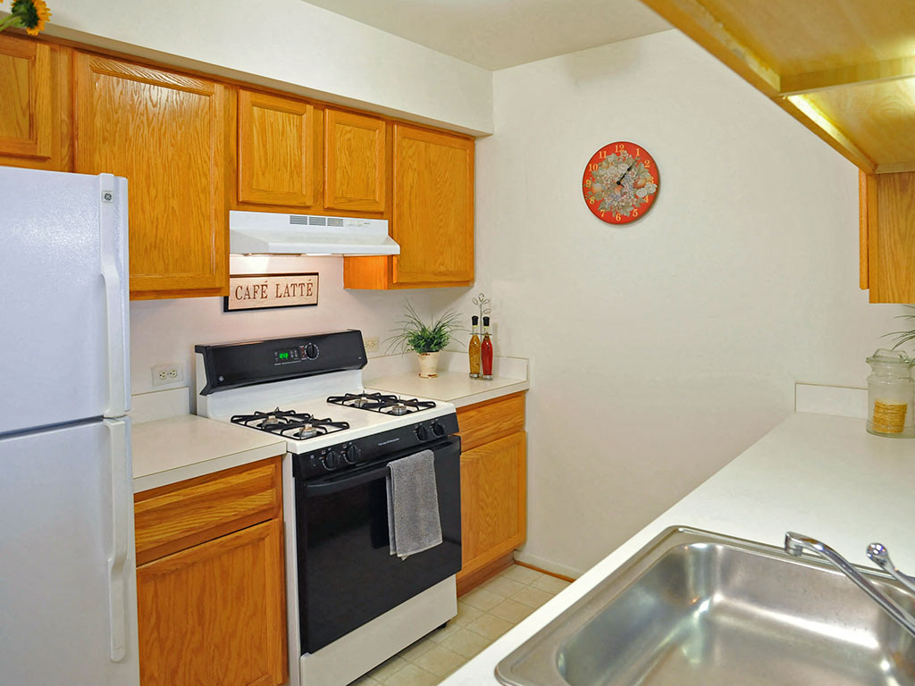 Well Equipped Kitchen at The Harbours Apartments, Clinton Twp, MI