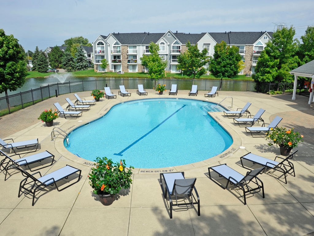 Gated Outdoor Pool and Sundeck at Hillside Apartments, Wixom, Michigan