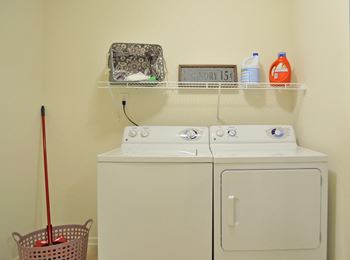 the laundry room has a washer and dryer