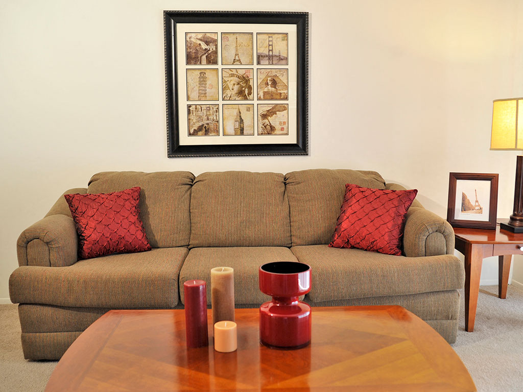 a living room with a couch and a coffee table