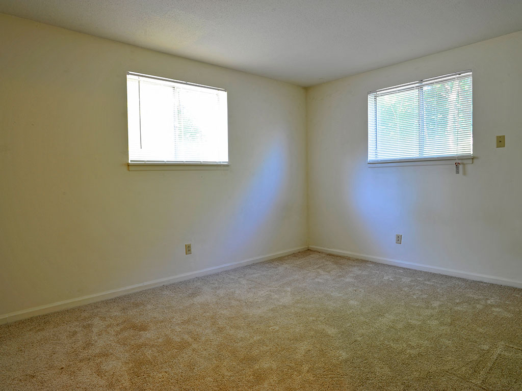 Bedroom with carpeting at Timberbrook Apartments, Peoria