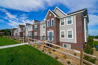 Professionally Landscaped Grounds Professionally Landscaped Grounds at Andover Pointe Apartment Homes, La Vista, NE - Photo Gallery