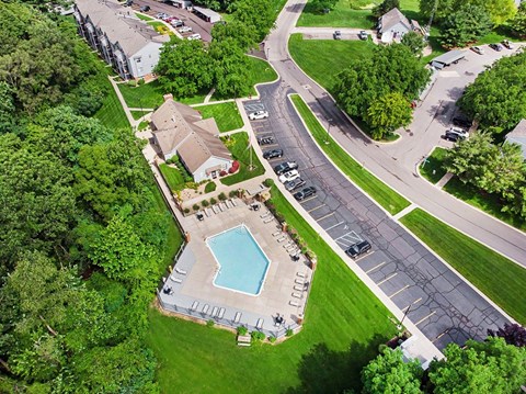 Aerial view of pool area and parking lot at Arbor Lakes Apartments, Elkhart, IN 46516