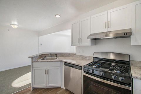 A kitchen with stainless-steel appliances at Black Sand Apartment Homes in Lincoln, NE