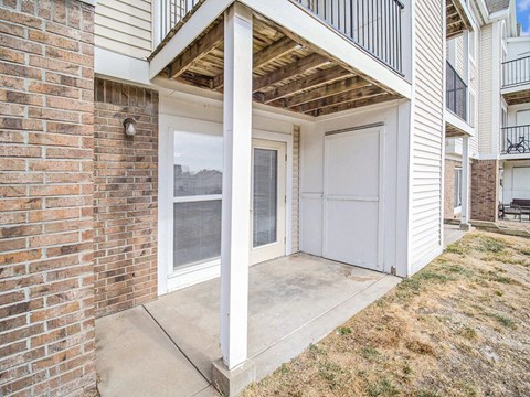 a private patio with enclosed storage at Black Sand Apartment Homes in Lincoln, NE