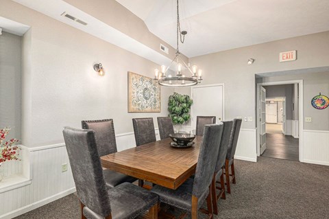 a clubhouse dining area with table and chairs at Black Sand Apartment Homes, Nebraska