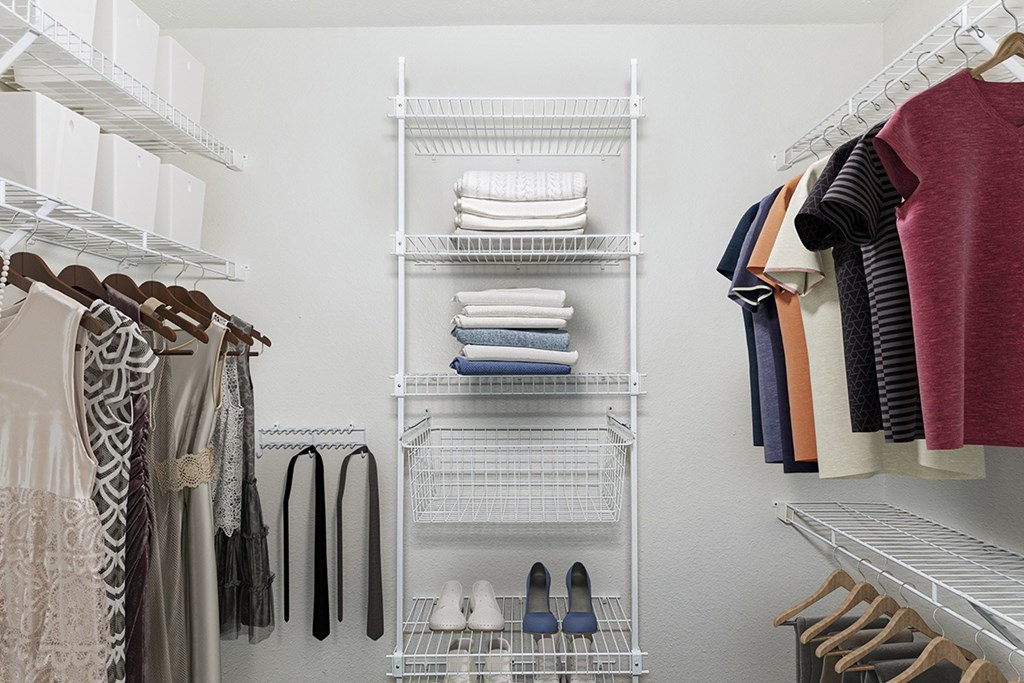 walk in closet with organizers at Brentwood Park Apartments in LaVista, NE