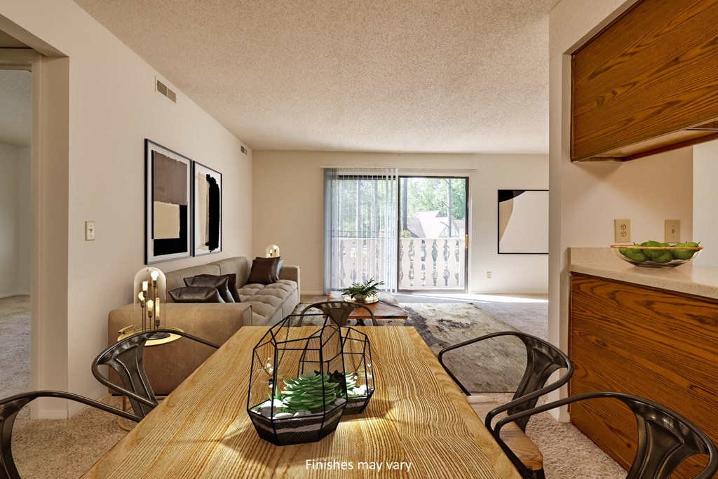 a spacious living room with a wooden dining table and chairs at Brook Pines, South Carolina