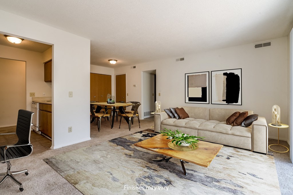 a living room with a couch and a table at Brook Pines, Columbia, 29210