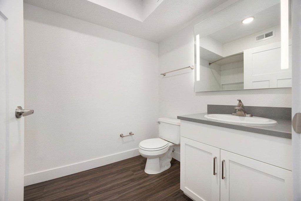 a renovated bathroom with hard surface floors Renovated kitchen  at Byron Lakes Apartments, Byron Center