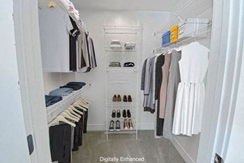 Walk-In Closets with Organizers at Byron Lakes Apartments in Byron Center, MI