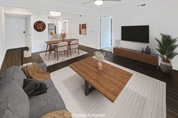 a living room with hard surface flooring at Byron Lakes Apartments in Byron Center, MI