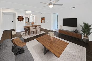 a living room with hard surface flooring at Byron Lakes Apartments in Byron Center, MI