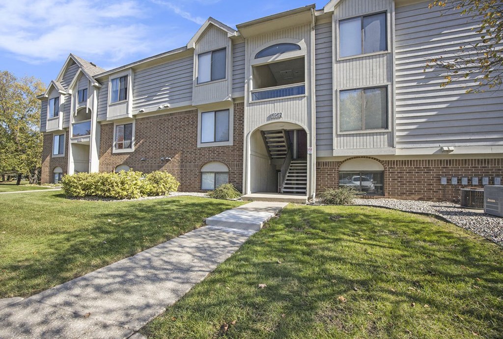 our apartments offer a walkway to the front of the building at Byron Lakes Apartments, Byron Center, Michigan