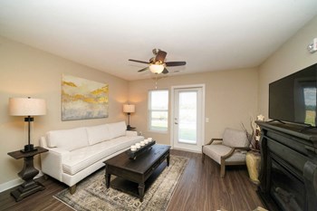 Living Room Leads To Patio Property Image