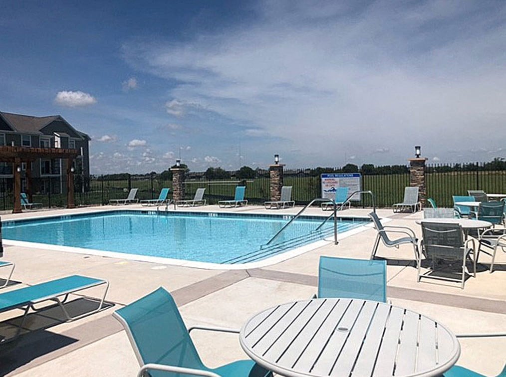 Poolside Lounge Area at Copper Creek Apartment Homes in Maize, Kansas