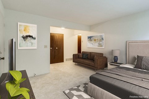 A bedroom with a large bed, a couch, and a painting on the wall.