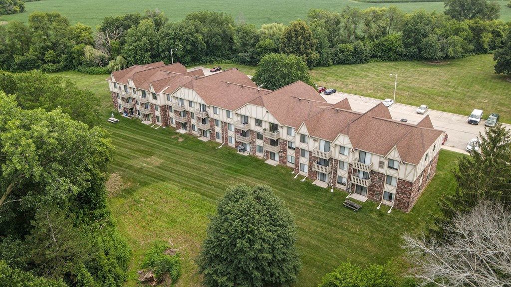 an aerial view of a large apartment complex with a grassy area in front of it at Beacon Hill and Great Oaks Apartments, Rockford, Illinois