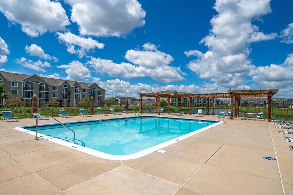 Swimming Pool with Lounge Seating at Fieldstream Apartment Homes, Ankeny, Iowa