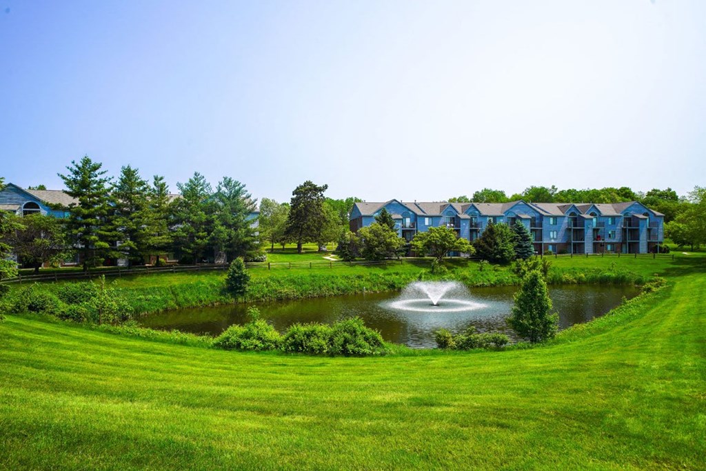 Acres of Green Lawns with a Pond at Green Ridge Apartments, Grand Rapids