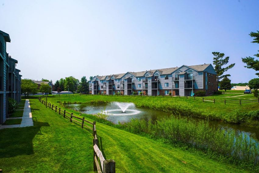 Large Pond within Community at Green Ridge Apartments, Michigan - Photo Gallery 1
