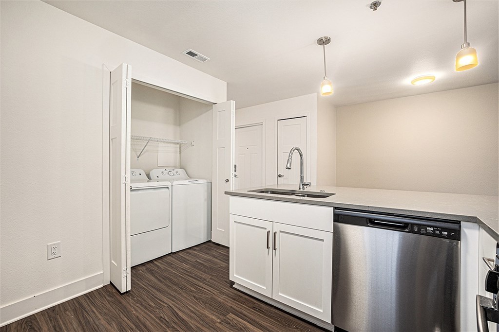 A modern kitchen with a stainless steel Appliances at The Grove Apartment Homes, Lincoln