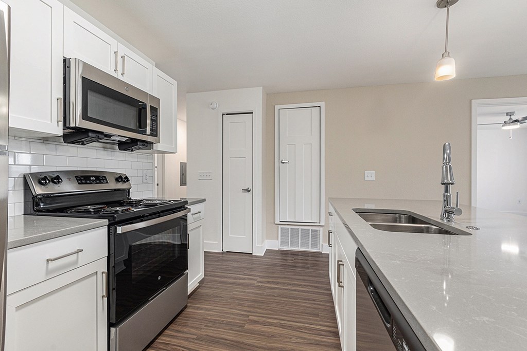 A modern kitchen at The Grove Apartment Homes, Lincoln, NE 68512