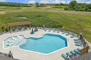 A large outdoor swimming pool at The Grove Apartment Homes, Nebraska, 68512