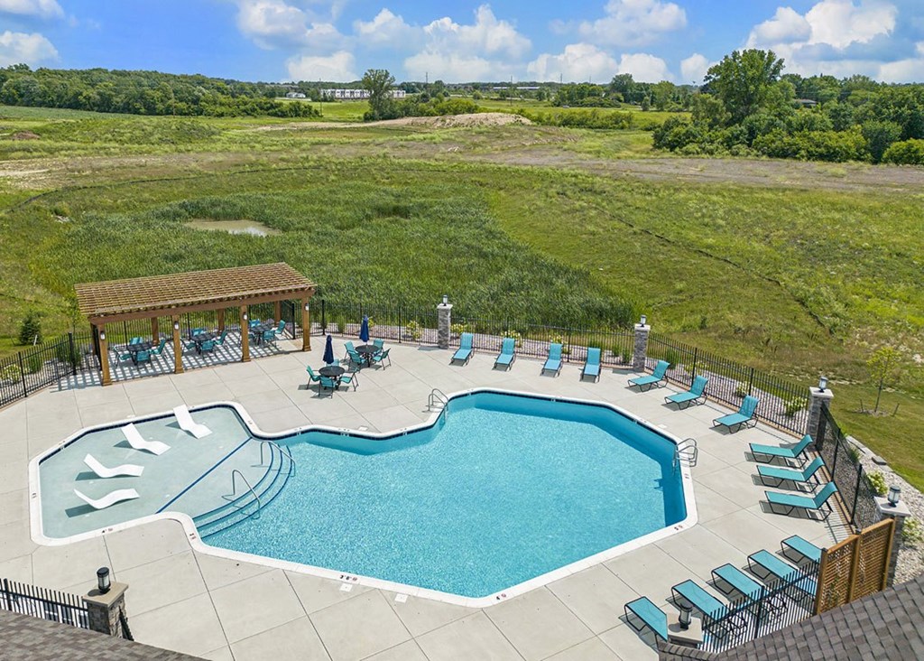 A large outdoor swimming pool at The Grove Apartment Homes, Lincoln