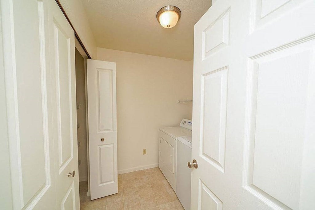 Laundry Room with Closet at Gull Prairie/Gull Run Apartments and Townhomes, Michigan