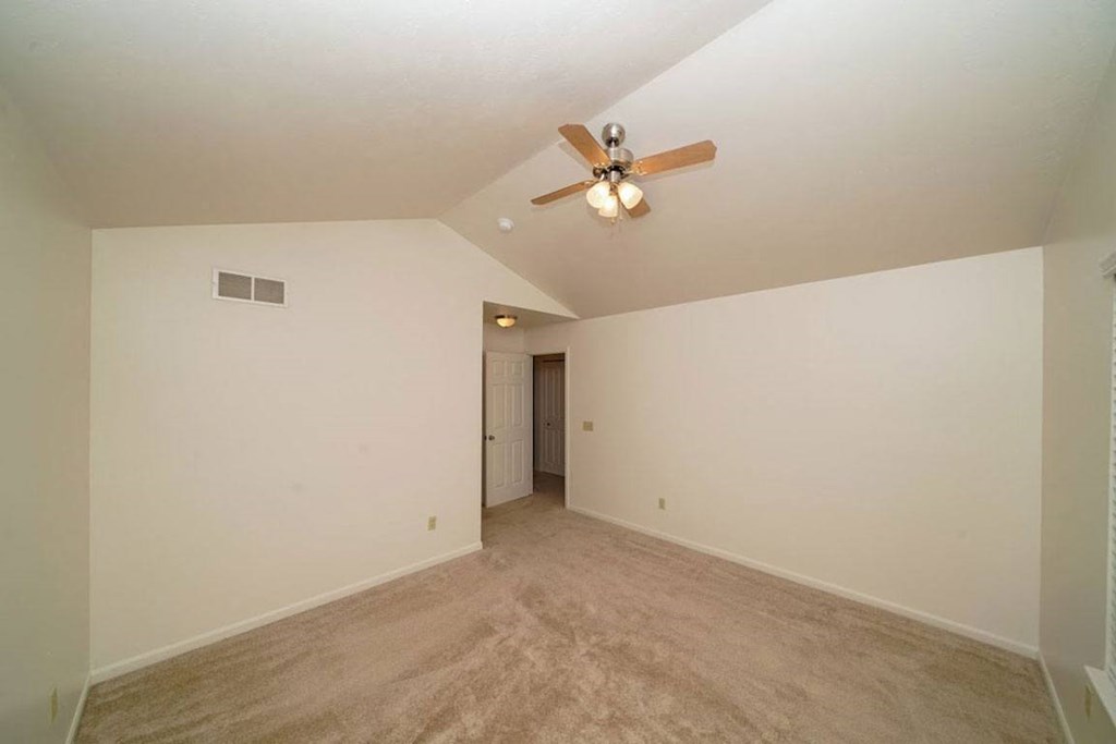 Master Bedroom with Vaulted Ceiling at Gull Prairie/Gull Run Apartments and Townhomes, Kalamazoo, Michigan