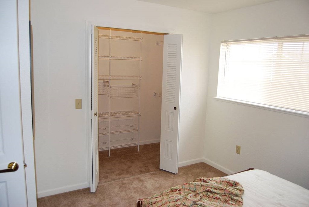 Walk In Closet with Organizers at Hunters Pond Apartment Homes in Champaign, IL