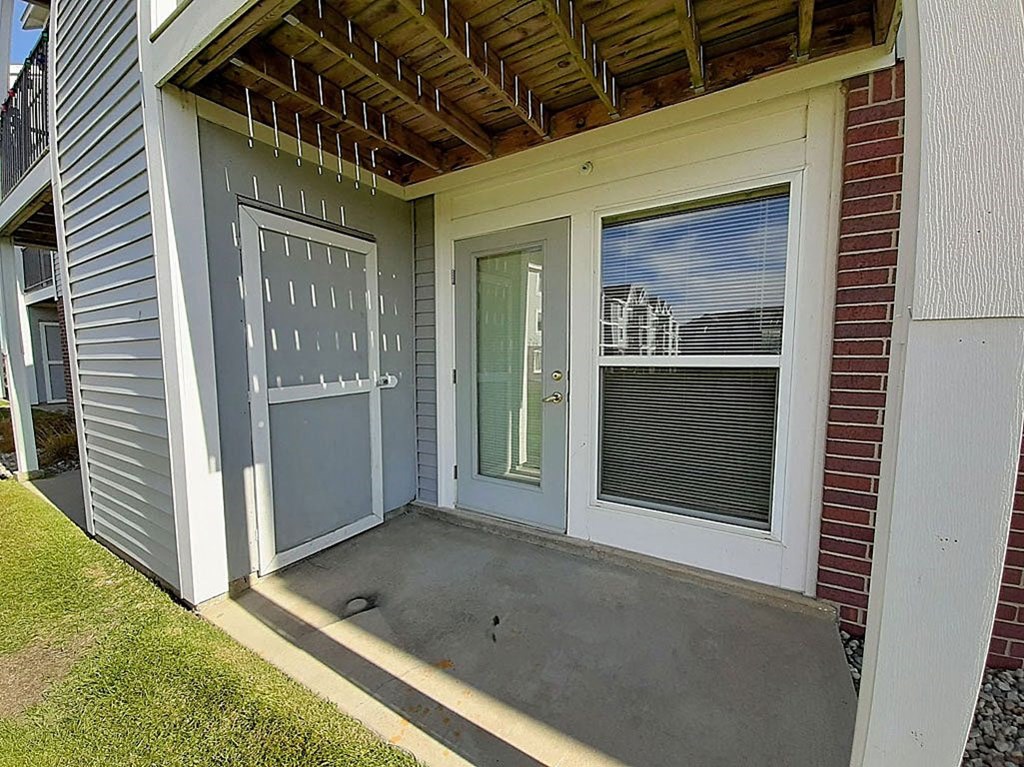 French Door to Private Patio at Hunters Pond Apartment Homes in Champaign, IL
