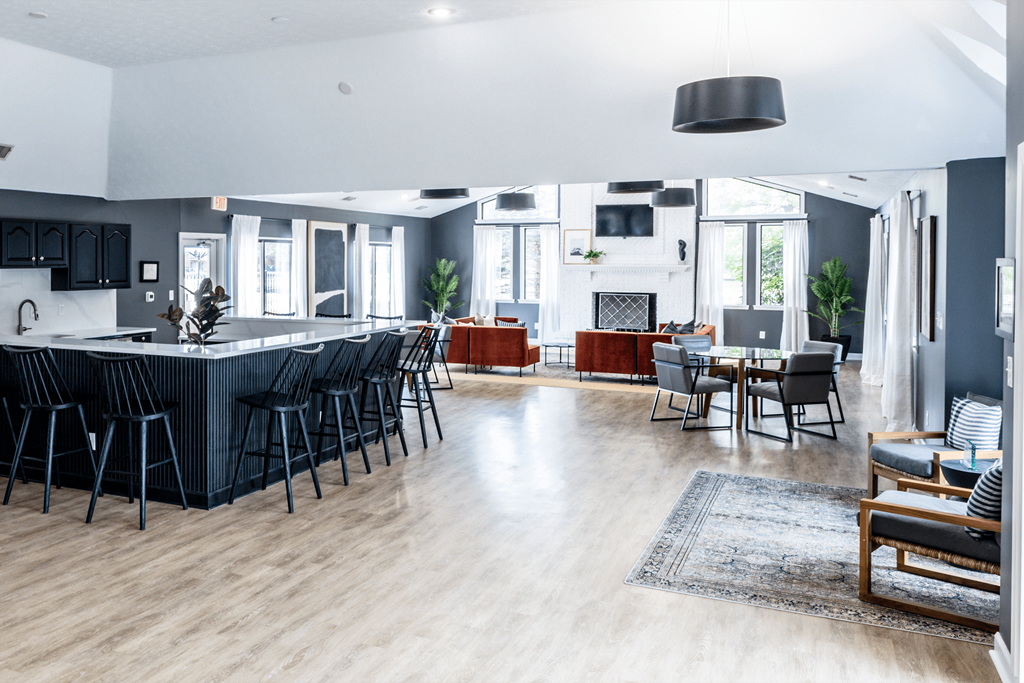 an open floor plan with a large kitchen and living room at Bavarian Village Apartments, Indiana, 46235