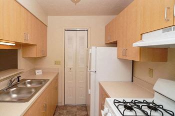 Fully Equipped Kitchen with Gas Stove at Irish Hills Apartments in South Bend, IN