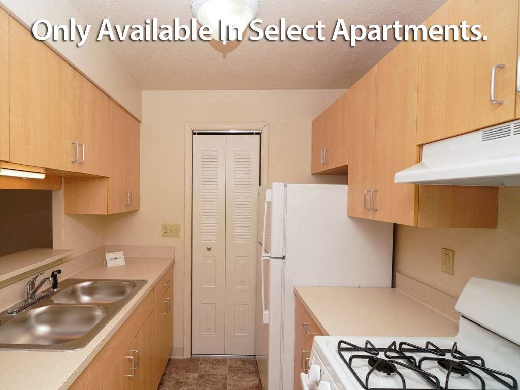 Kitchen with pantry at Irish Hills Apartments, South Bend, IN