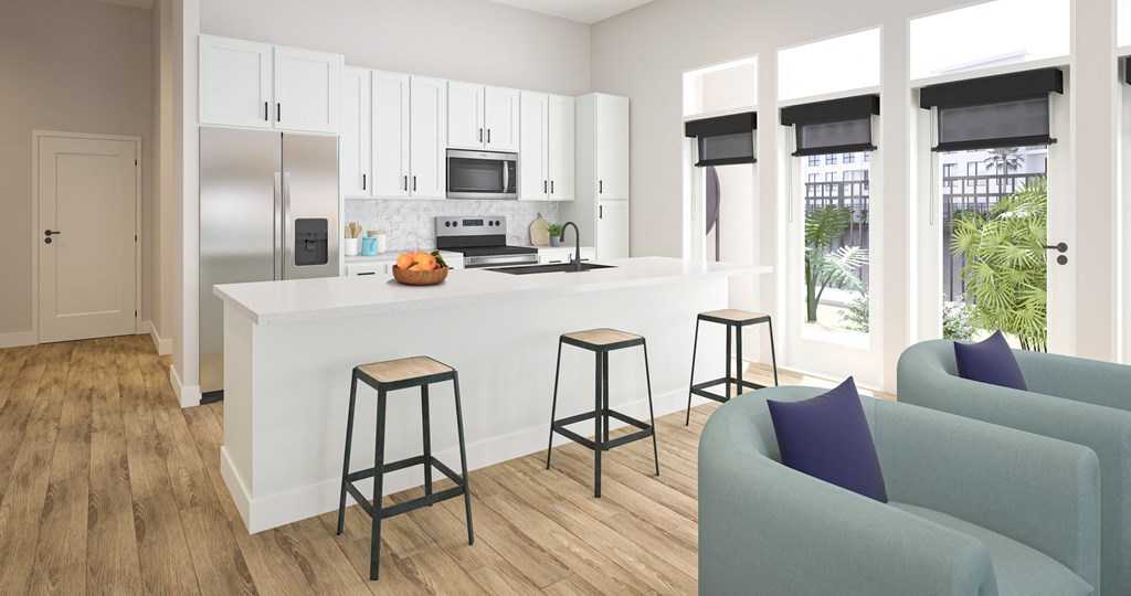 an open floor plan with a kitchen and living room at Ironwood Flats, Florida