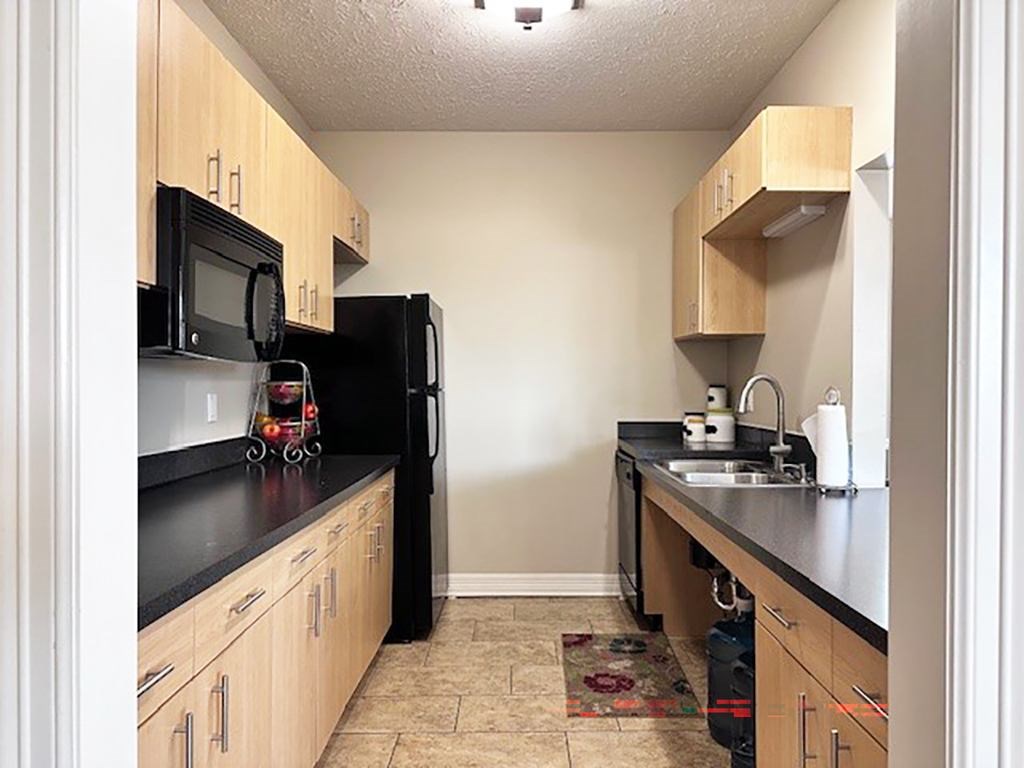 A kitchen in the community building at Lynbrook Apartments and Townhomes in Elkhorn, NE