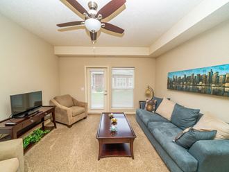 Classic Living Room Design With Television at Lynbrook Apartment Homes and Townhomes, Elkhorn, NE, 68022