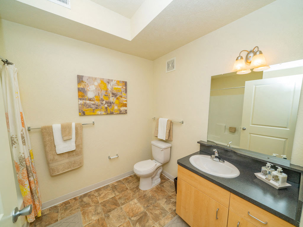 Bathroom With Extra Storage Space at Lynbrook Apartment Homes and Townhomes, Elkhorn, NE, 68022