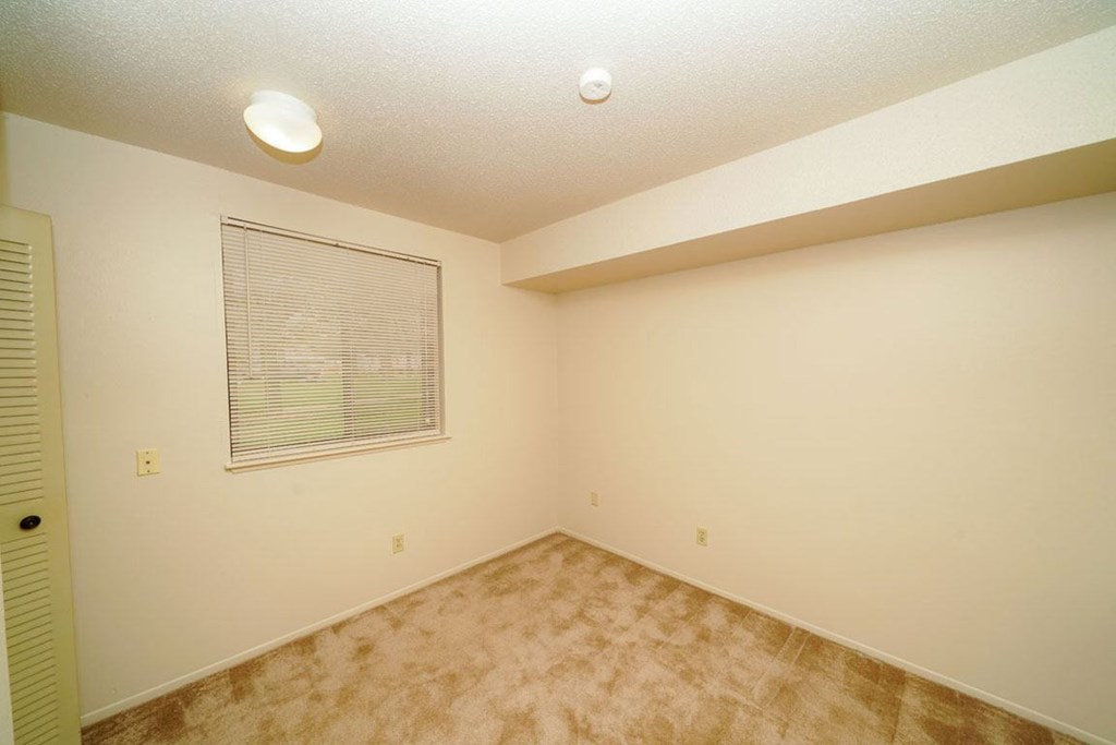 Spacious Bedroom at Madeira Apartments in Kalamazoo, MI