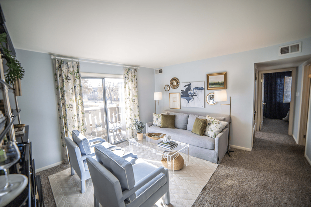 Living Room With Private Balcony at Bavarian Village Apartments, Indianapolis, 46235