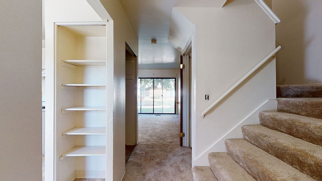 An entryway leading to sliding glass doors to a patio at Mount Royal Townhomes, Kalamazoo, MI