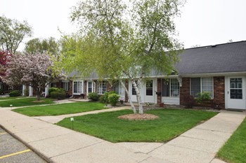 Expertly Landscaped Grounds Expertly Landscaped Grounds at Newport Village Apartments, Portage, Michigan - Photo Gallery 3