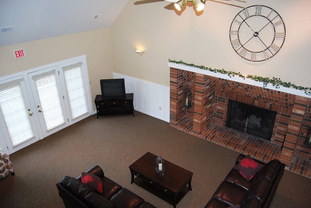 Clubhouse with High Ceiling and Fireplace at Newport Village Apartments, Portage, MI