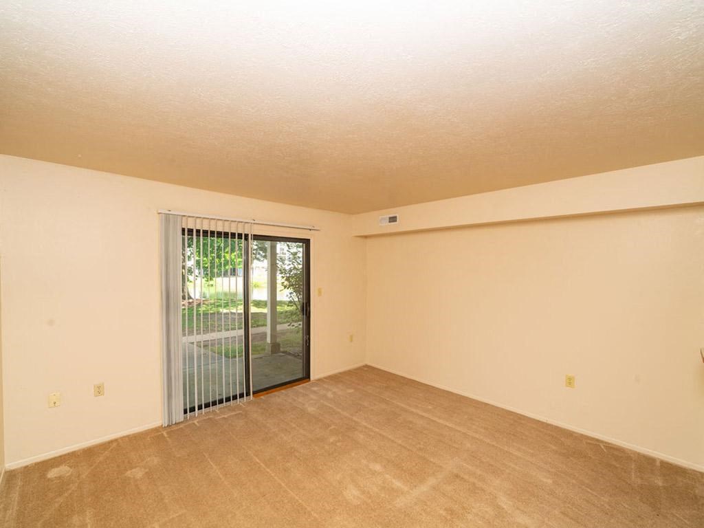 Living Room With Glass Door at North Pointe Apartments, Indiana, 46514