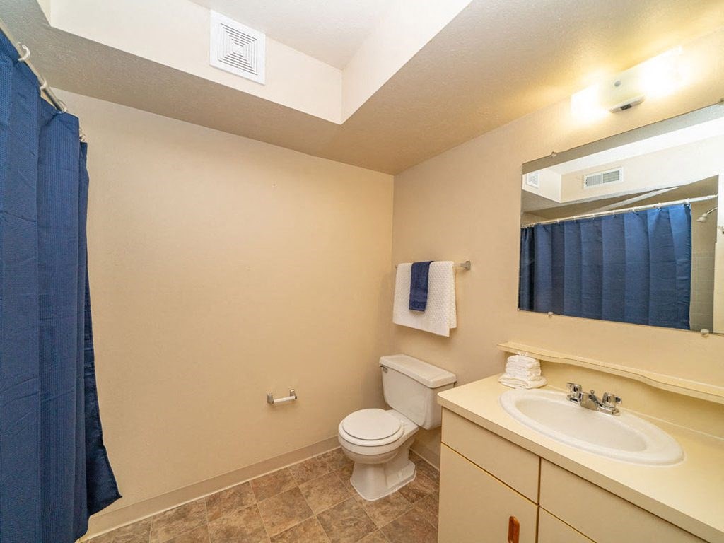 Western Toilet In Bathroom at North Pointe Apartments, Elkhart